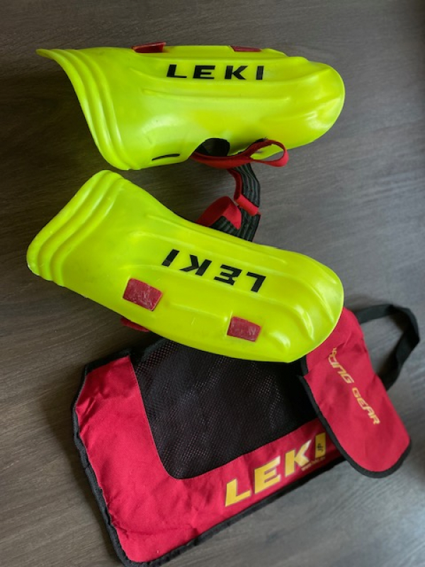 Chrániče holení LEKI Shin Guard Worldcup Pro Junior Neon